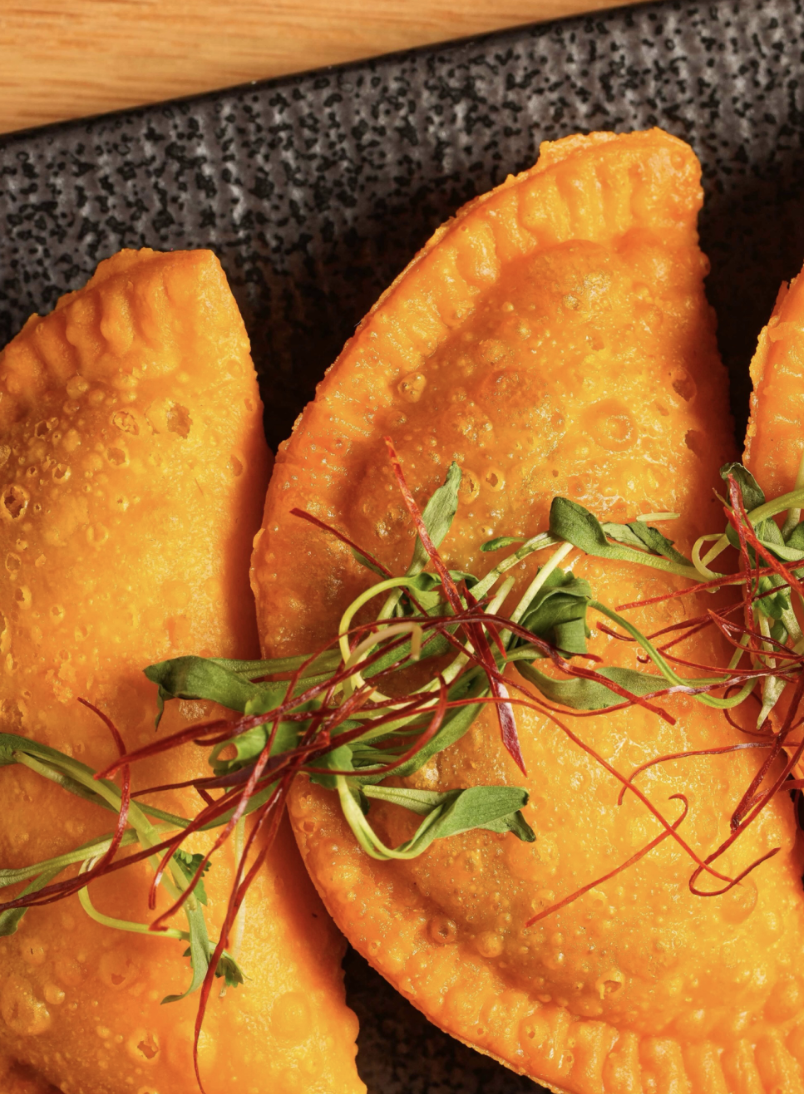 Quesa-birria empanadas with micro greens